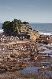 High angle view of tourists on beach