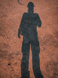 Shadow of man on wall