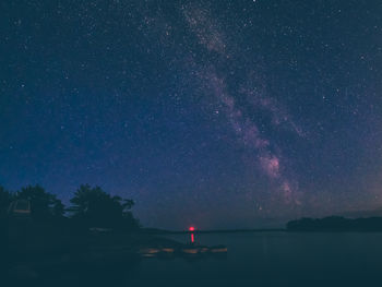 Scenic view of star field against sky at night