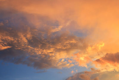 Low angle view of clouds in sky during sunset