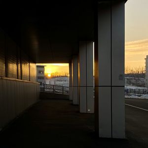 Illuminated bridge against sky during sunset