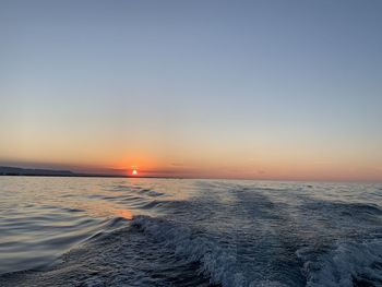 Scenic view of sea against sky during sunset