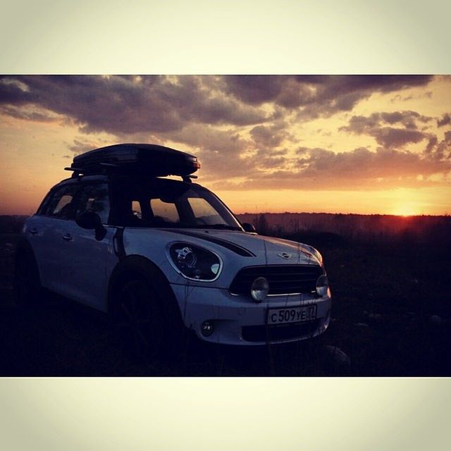 sunset, land vehicle, car, transportation, sky, transfer print, mode of transport, silhouette, auto post production filter, cloud - sky, cloud, travel, landscape, scenics, beauty in nature, nature, orange color, dusk, outdoors, tranquil scene