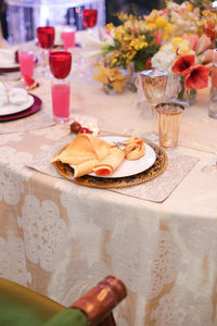 High angle view of wine glass on table