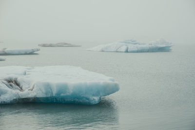 Scenic view of frozen sea against sky