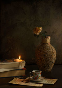 Close-up of flower vase on table