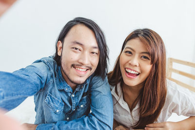 Portrait of a smiling young couple