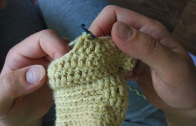 Close-up of hand holding hands