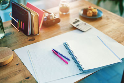 High angle view of office supplies on table