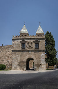 View of historic building against clear blue sky