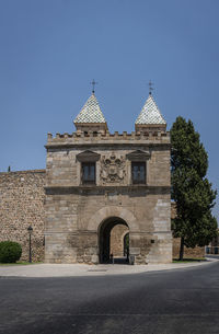 Ancient gateway in the city of toledo, spain