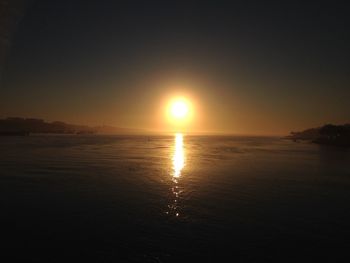 Scenic view of sea against sky at sunset