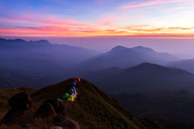 Scenic view of mountains against sky during sunset