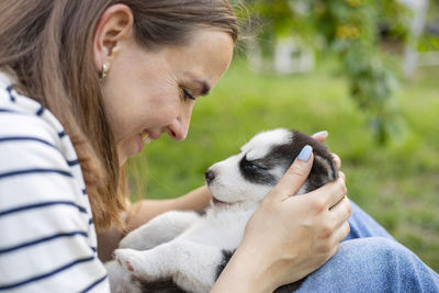 Close-up of woman with dog