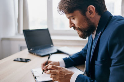 Man working on table