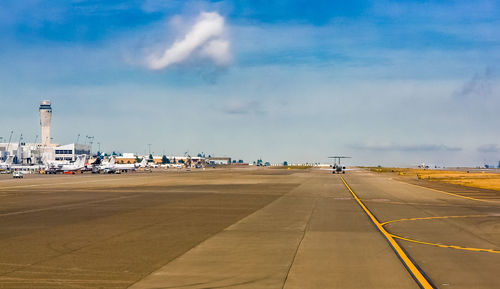 View of airport runway against sky