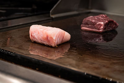 Close-up of sushi on cutting board