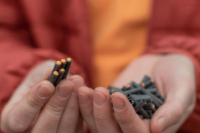 Close-up of woman holding hands