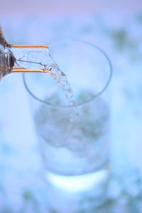 Close-up of drink in glass bottle