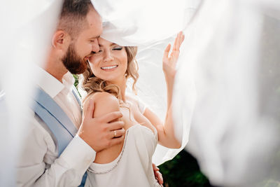 Young couple holding hands