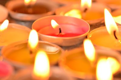 High angle view of illuminated candles