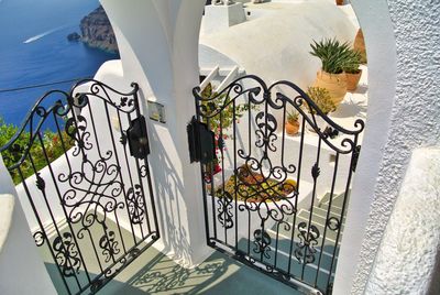 High angle view of metal railing against wall