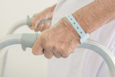 Close-up of hand holding smart phone