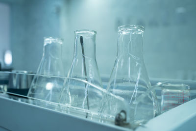 Close-up of bottles in laboratory