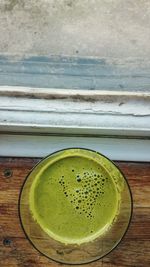 Close-up of drink on wooden table