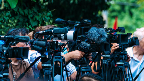 Group of cameras at an outdoor event