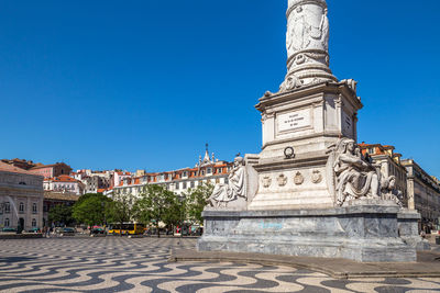 View of historic building against clear blue sky