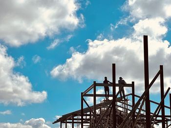 Low angle view of metallic structure against sky