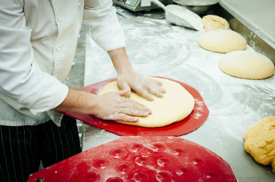 High angle view of man preparing food