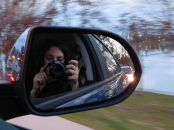 Reflection of road on side-view mirror