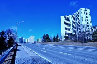 Road leading towards buildings