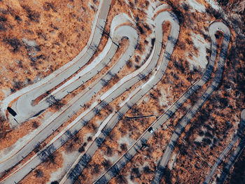 Aerial view of curvy mountain road, valsassina, italy.