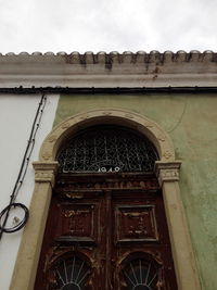 Low angle view of historic building against sky