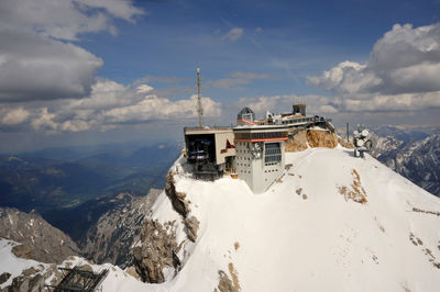 High angle view of buildings on zugspitze against sky during winter