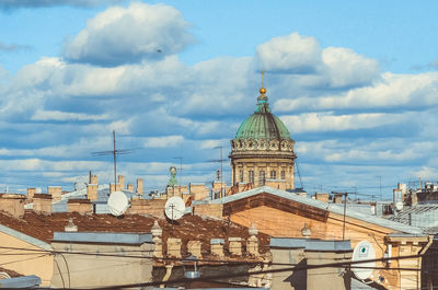 Panoramic view of buildings in city against sky