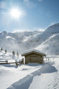 Wooden hut in winter wonderland in sportgastein ski resort, gastein, salzburg, austria