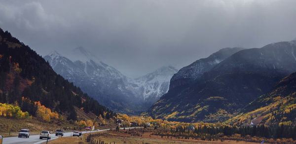 Panoramic view of snowcapped mountains against sky