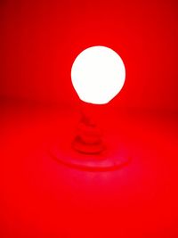 Close-up of illuminated light bulb
