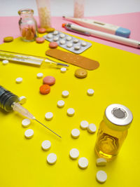 High angle view of bottles on table