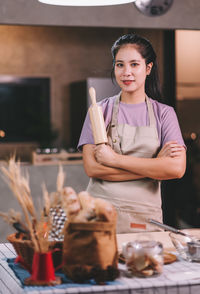 Portrait of young woman using mobile phone