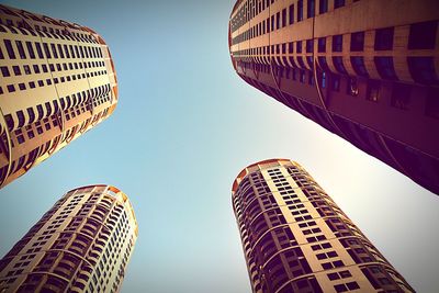 Low angle view of building in city against sky