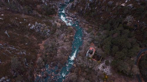 High angle view of people on rock in cave