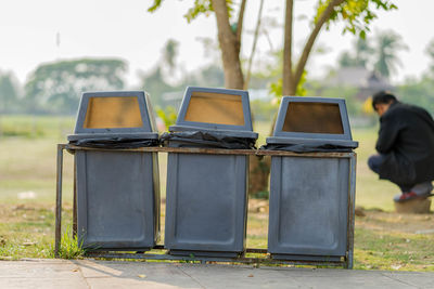 Garbage bins on field