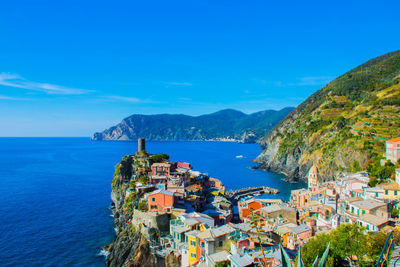 High angle view of sea against blue sky