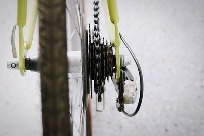 Close-up of bicycle gear on street
