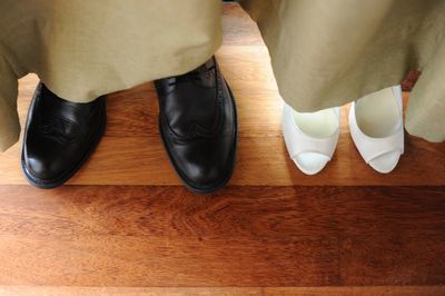 High angle view of woman on hardwood floor